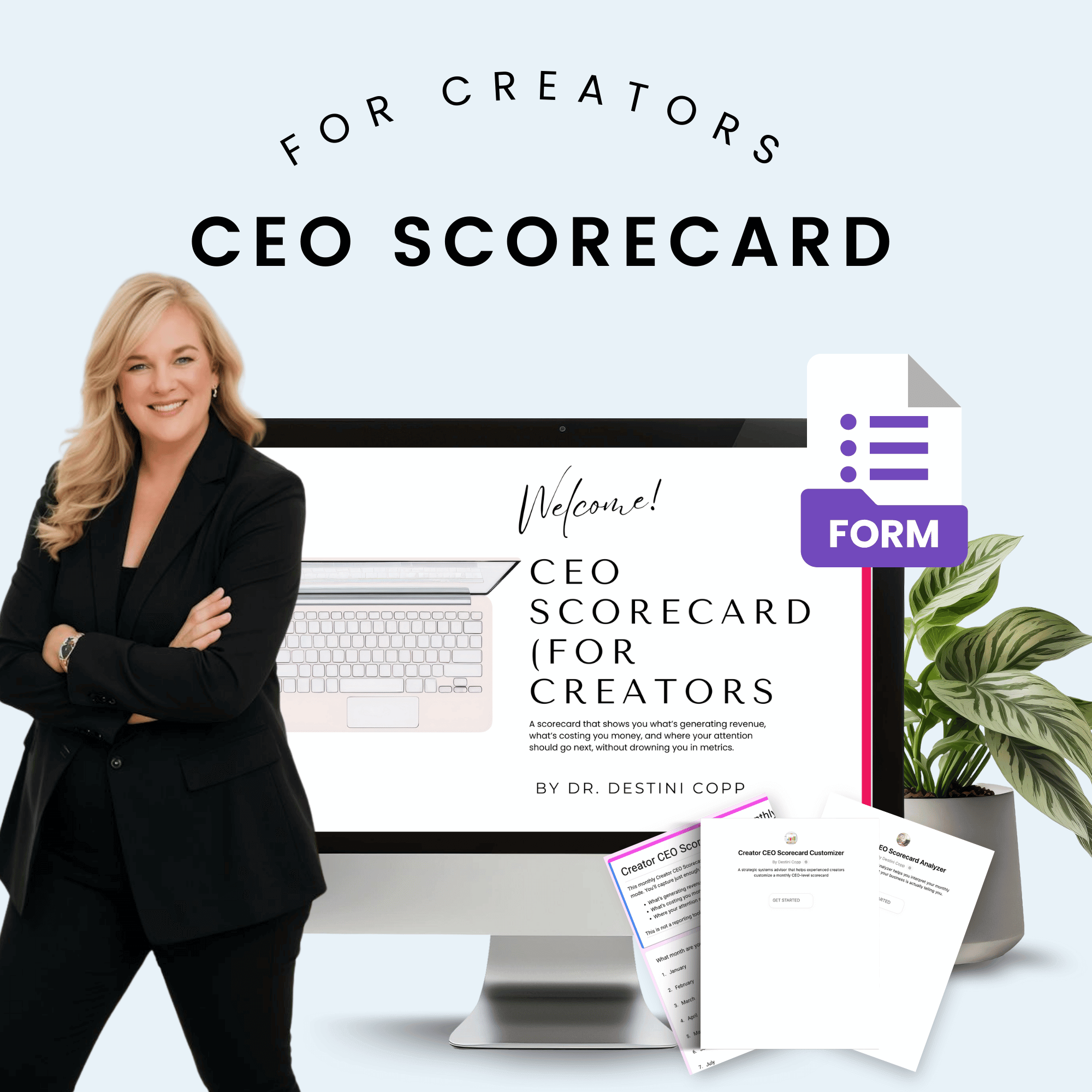 Woman in a black suit standing next to a computer screen displaying &